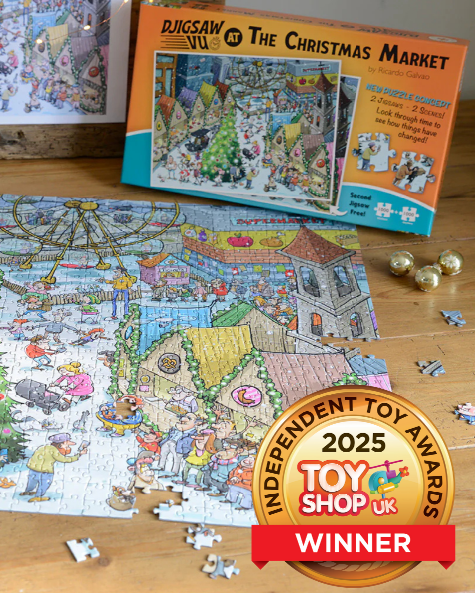 Jigsaw puzzle set with Christmas market theme on a wooden surface, featuring the Independent Toy Awards 2025 winner badge.